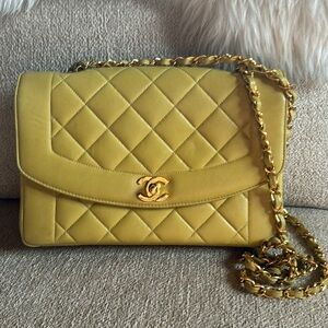 Chanel shoulder bag 9 3/4 wide 6 3/4 tall and 3 inches wide.